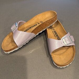 Brand new. Never worn.  Birkenstock sandals